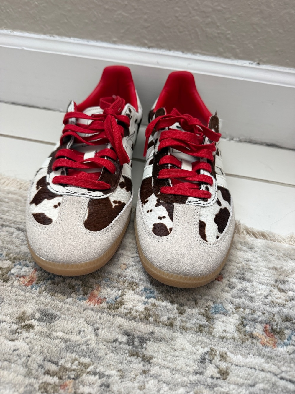 Adidas cow print sneakers